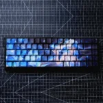 Captivating Wuthering Waves Shorekeeper PBT dye-sub keycaps set featuring a premium mystical guardian aesthetic with deep ocean hues and rugged textures.