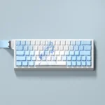 A collection of Shorekeeper PBT Keycaps Set, Cherry profile, shown from multiple perspectives, emphasizing their serene coastal design and the captivating design.