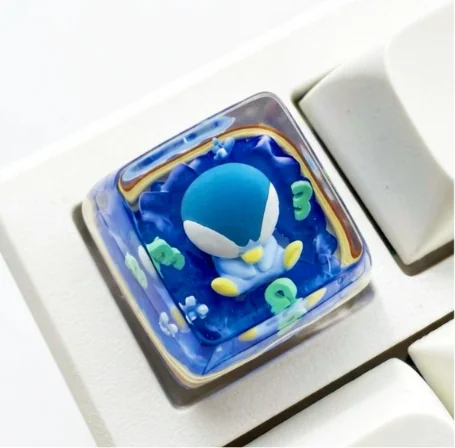 Handcrafted luminous Piplup SA keycap, a vibrant, translucent resin art piece in iconic SA profile, evoking playful childhood wonder.