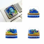 Meticulously sculpted Totodile Pokemon SA keycap, handcrafted from vibrant resin, featuring its iconic profile and intricate details.