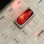 Luminous Sorcerer's Stone Keycap, an artisan backspace. Multiple angles reveal its mystical glow, wizarding artifact, and stone enchantment.