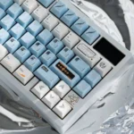 A collection of SpaceStation PBT Keycaps Set from various angles, showcasing their durable build, bold futuristic design, and intricate cosmic command center.