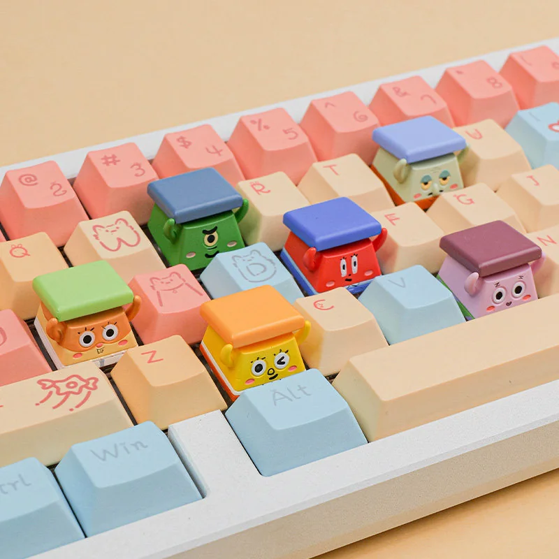 Vibrant SpongeBob peeking keycap from multiple angles, showcasing the whimsical 3D cartoon design on a mechanical keyboard, a playful artisan accessory.