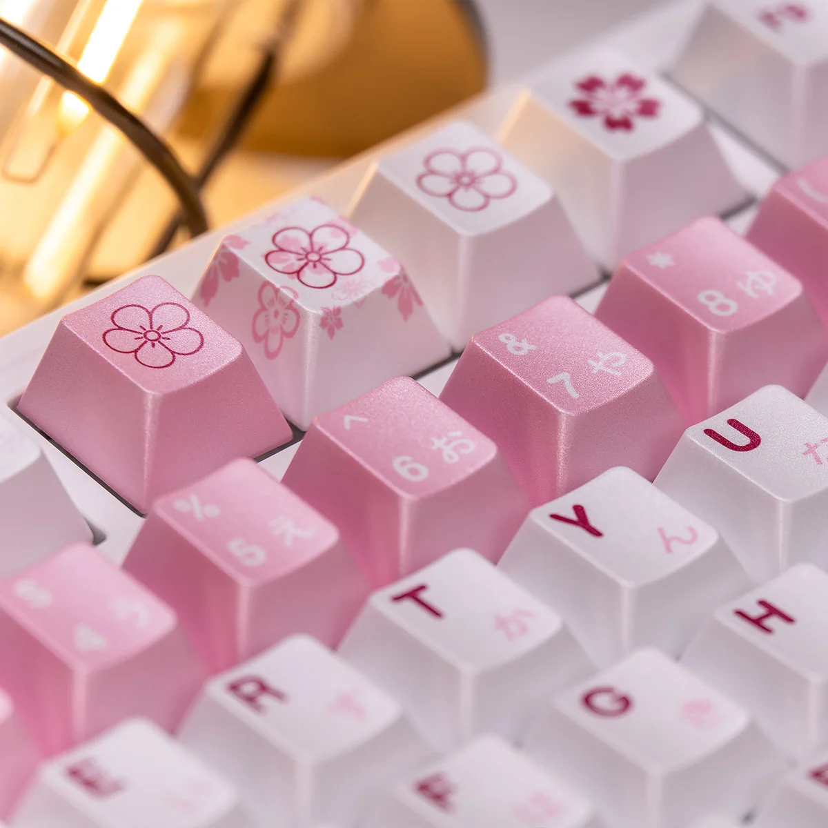 Exquisite Spring Bloom Pearlescent Keycap Set artfully displayed from various angles, highlighting its delicate spring blossoms.