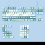 Elegant Spring Notes PBT Dye-sublimation Keycaps set displayed from various angles, revealing delicate spring blossoms, soft hues, and artistic detail.