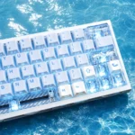 Spring Tide Ocean Island PBT keycaps, gallery view. Highlighting serene spring tide hues, minimalist side-engraved legends, and soft backlit glow.