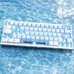 Spring Tide Ocean Island PBT side-engraved backlit keycaps glowing with serene ocean hues, showcasing minimalist legends for a tranquil keyboard.