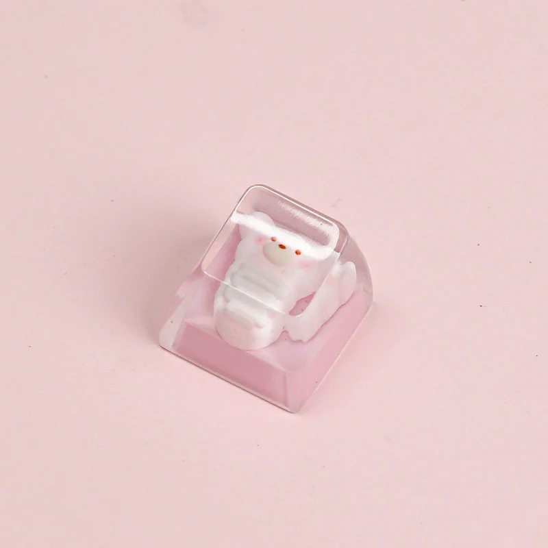 Close-up of a whimsical Strawberry Bear Pizza Artisan Keycap, showcasing its handcrafted resin, vibrant colors, and glossy finish from various playful.