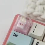 Adorable handcrafted Strawberry Butter Bear White Chocolate Artisan Resin Keycap, a sweet food-themed ESC keycap with vibrant details.