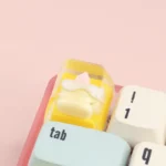 Close-up of a whimsical handcrafted dessert keycap, revealing its intricate, realistic details and sweet charm from a delightful new angle, ideal for food lovers.