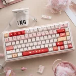 Sweet Strawberry Keycaps: Durable PBT dye-sub set with a playful dessert motif in pastel pinks, reds, and creams. Charming and high-quality.