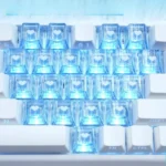 Charming Sweetheart Sparkle Heart Supplement Keycap Set, featuring translucent, sparkling heart-shaped keycaps in soft hues from a delightful angle.