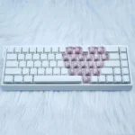 Charming Sweetheart Sparkle Heart Supplement Keycap Set displayed from multiple angles, highlighting their sparkling translucent finish and soft, playful hues.
