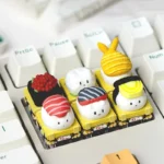 Vibrant, handcrafted resin sushi cat artisan keycap for ESC, intricately detailed from various angles, adding artistic whimsy to any mechanical keyboard.