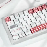 Close-up of Sweet BoBo PBT dye-sub keycaps set, showcasing their charming pastel hues and bubbly design from various angles, perfect for playful keyboard.