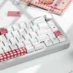 Close-up of Sweet BoBo PBT dye-sub keycaps set, showcasing their charming bubbly design and soft pastel colors for playful keyboard personalization.