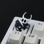 Detailed views of the exquisite Hollow Knight The Knight resin keycap, highlighting its intricate dark fantasy design.