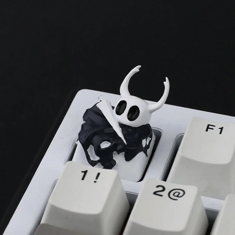 Detailed views of the exquisite Hollow Knight The Knight resin keycap, highlighting its intricate dark fantasy design.