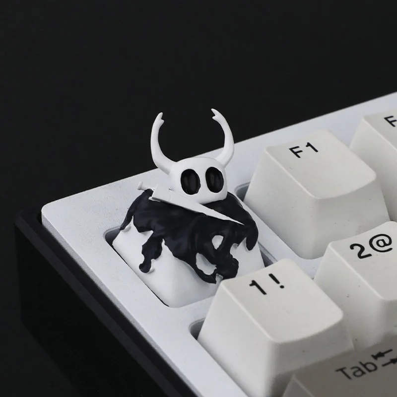 Exquisite handcrafted Hollow Knight The Knight resin keycap from multiple angles, showcasing its intricate dark fantasy design and artisan quality.