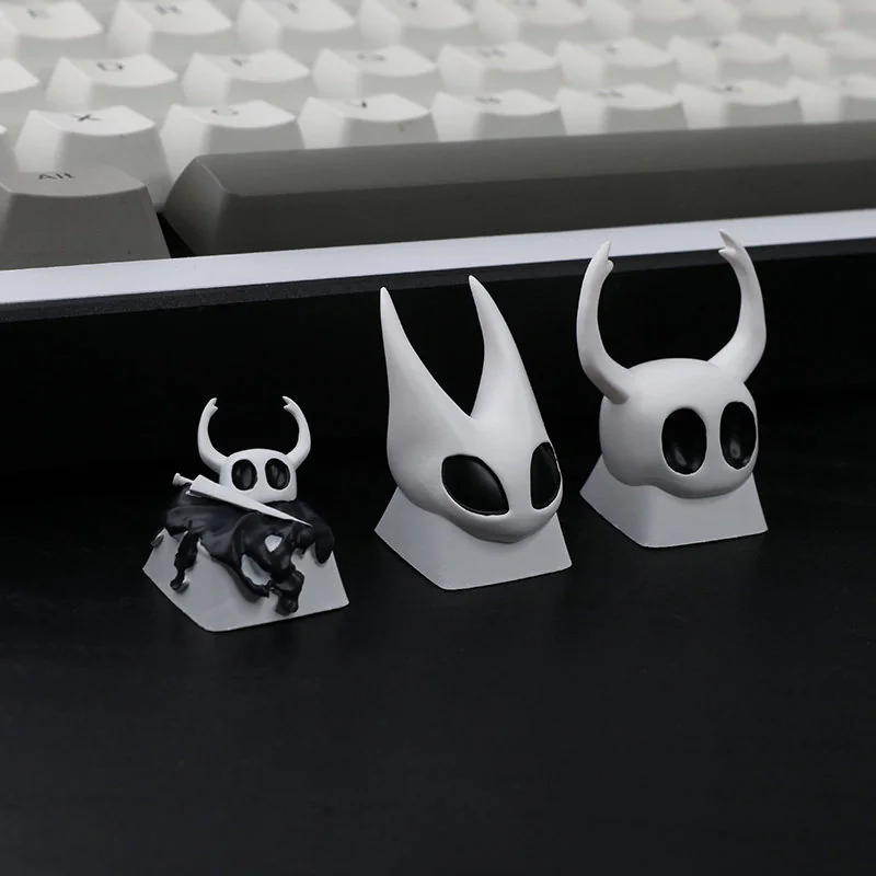 Exquisite handcrafted Hollow Knight The Knight artisan resin keycap, detailed from various perspectives, showcasing its intricate dark fantasy design.