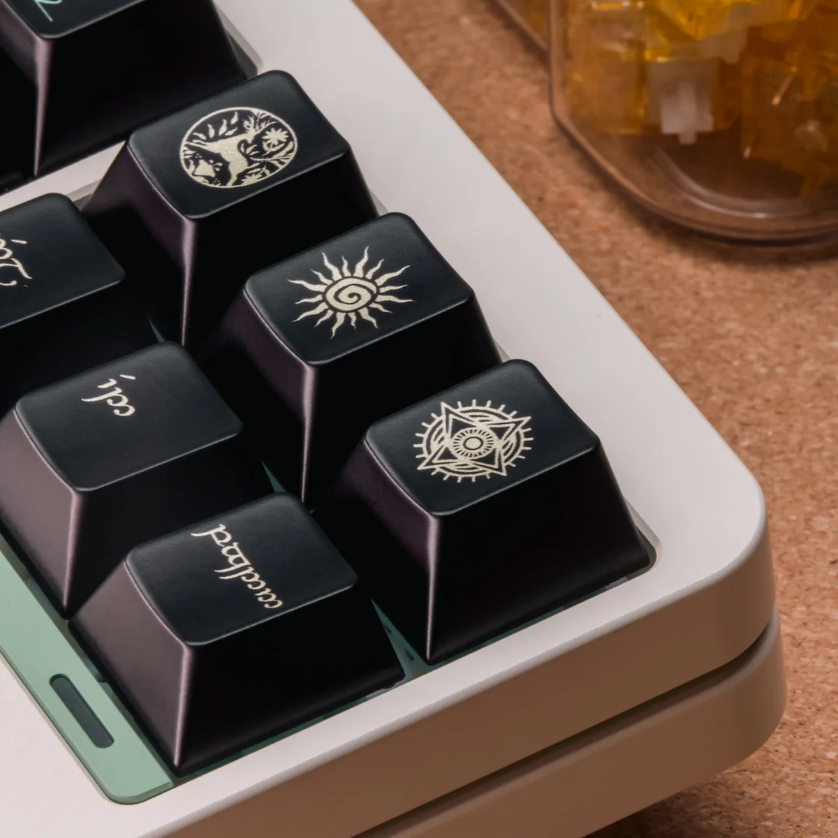 Black-Gold PBT Keycaps Set, viewed from multiple angles, highlighting their unique, luxurious black-gold metallic finish and mythical elegance.