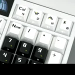 Time Warp Keycaps Set: Luminous side-engraved PBT set. Futuristic time-travel aesthetic, illuminated legends, and premium design optimize for immersive design.