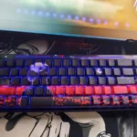 Exclusive Tokyo Ghoul Ken Kaneki side-lit PBT keycaps set, featuring the dark, mysterious anime aesthetic and subtle glowing legends shown from multiple angles.
