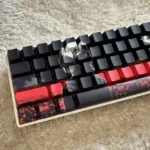 Exclusive Tokyo Ghoul Ken Kaneki side-lit PBT keycaps set, displayed from various angles, highlighting its dark anime aesthetic and subtle, mysterious touch.
