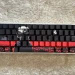 Exclusive Tokyo Ghoul Ken Kaneki side-lit PBT keycaps set, presented with a dark, mysterious anime aesthetic and subtle glowing legends, perfect for fans.