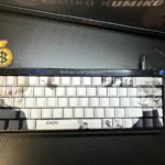 Dark, anime-inspired Tokyo Ghoul side-printed shine-through PBT keycaps set, beautifully illuminated and shown from multiple artistic angles.