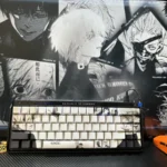 Artistic gallery view of Tokyo Ghoul side-printed shine-through PBT keycaps set, highlighting the dark aesthetic and illuminated anime legends from various angles.