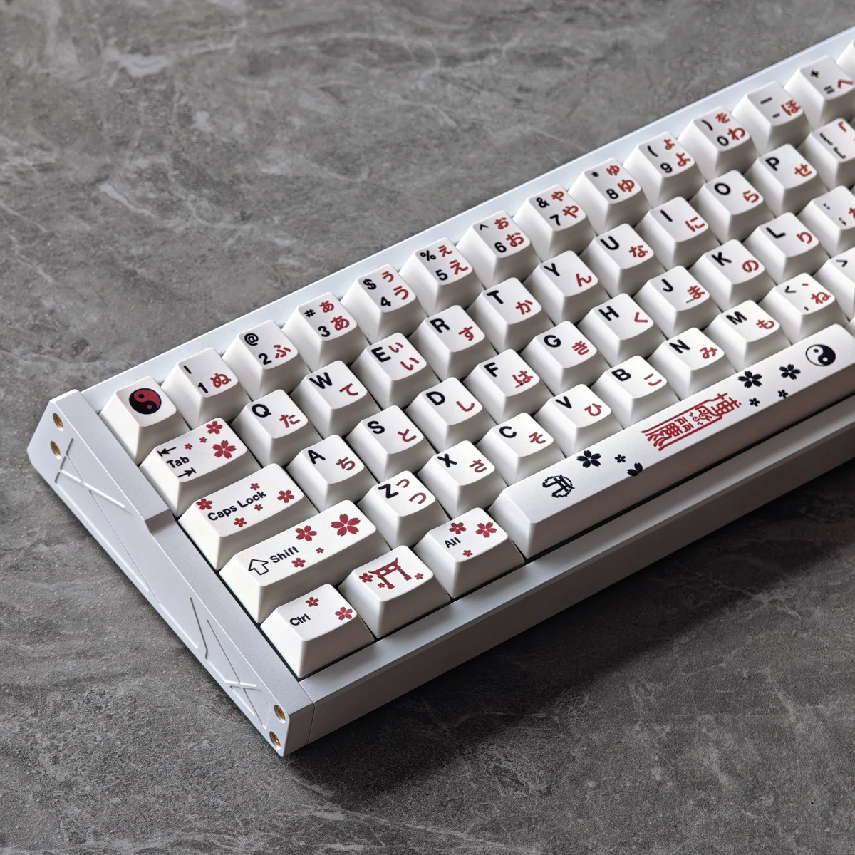 A vibrant Touhou Reimu Hakurei PBT dye-sub keycap set displayed from multiple artistic angles, showcasing the iconic anime art and durable quality.