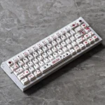 Vibrant Touhou Reimu Hakurei PBT Dye-Sub keycaps Set artfully displayed from multiple angles, showcasing their iconic anime design and premium durability design.