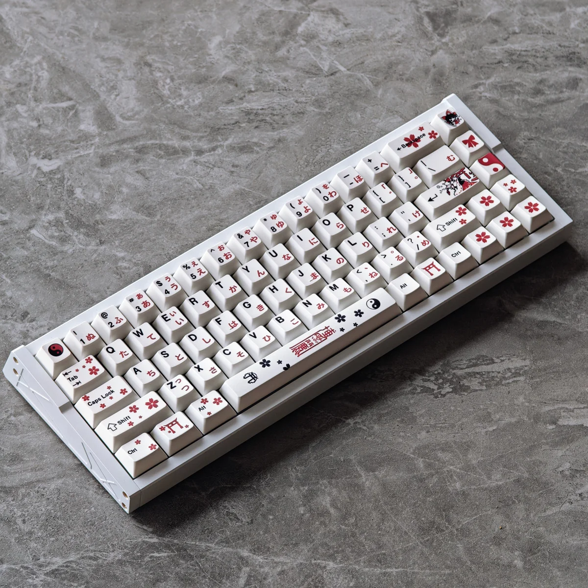 Vibrant Touhou Reimu Hakurei PBT Dye-Sub keycaps Set artfully displayed from multiple angles, showcasing their iconic anime design and premium durability design.