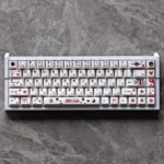 Vibrant Touhou Reimu Hakurei PBT Dye-Sub keycap set, showcasing iconic anime art for keyboards.