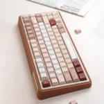 Charming UR82 Caramel Isle tri-mode mechanical keyboard from multiple angles, highlighting its cute milk brown keycaps, quiet typing.