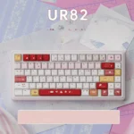 A playful, multi-angle view of the Cute UR82 Strawberry Dessert Tri-mode Mechanical Keyboard, showcasing its sweet pastel hues design.