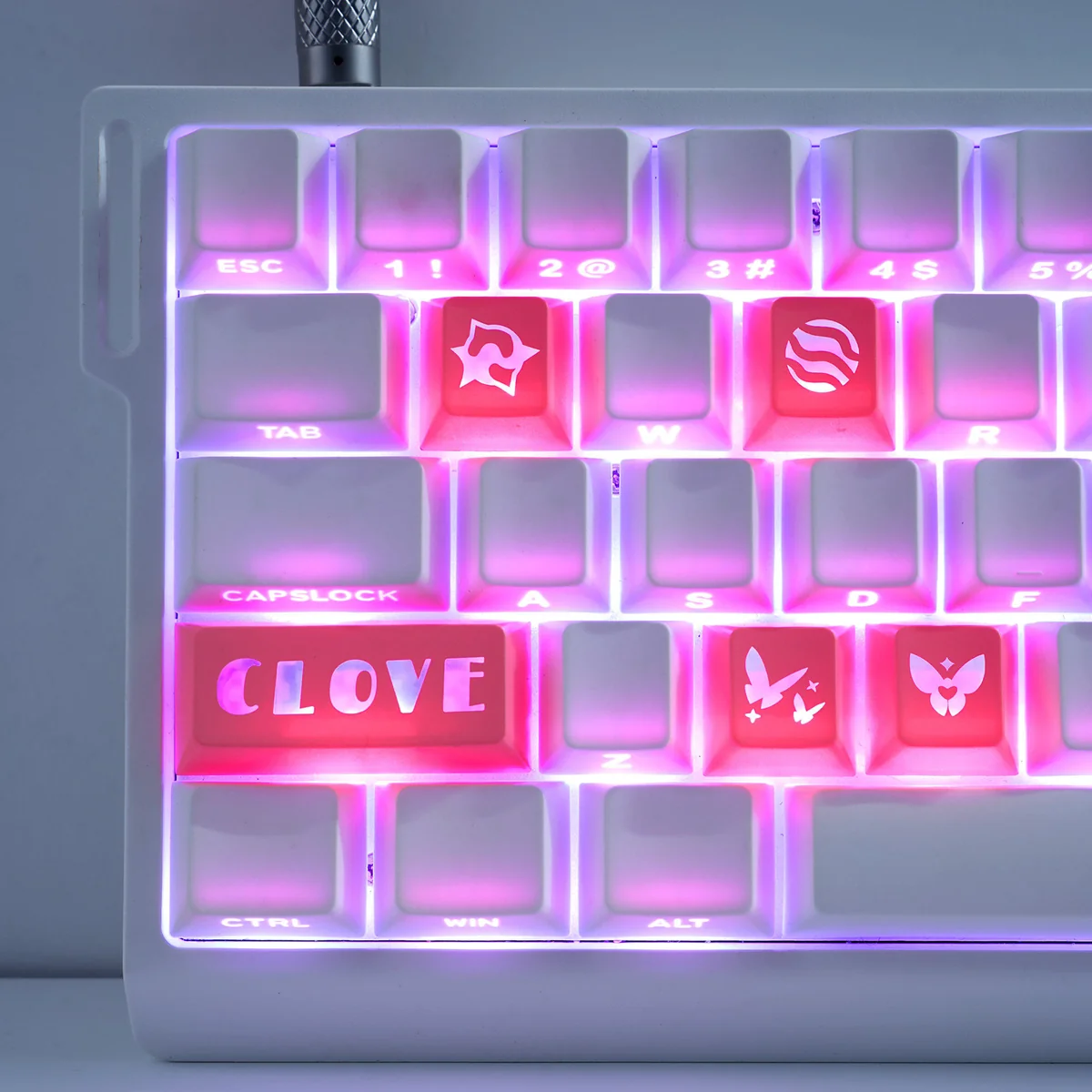 Dive into Valorant with Valorant: Agent's Skill Supplement Keycap Set, showcasing vibrant translucent PC designs from multiple angles for ultimate gaming immersion.