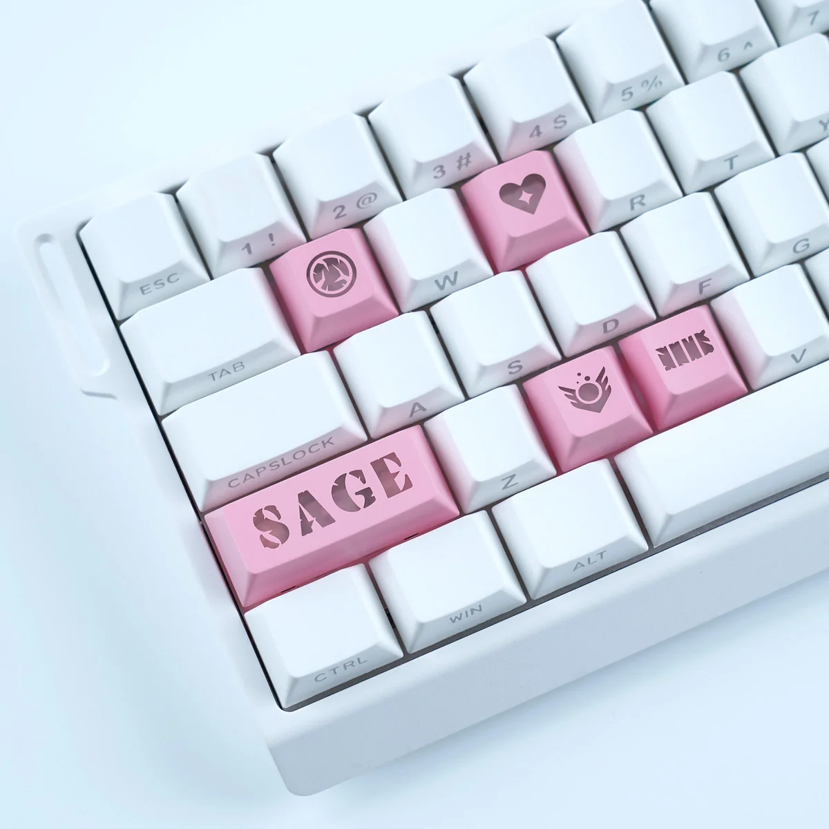 Playful Valorant: Agent's Skill Supplement Keycap Set gallery. View vibrant translucent PC keycaps and crisp, iconic game ability icons from multiple angles for ultimate design.