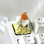 A close-up side view of the whimsical 'Weaver of Light' ESC resin artisan keycap, showcasing its ethereal yellow and purple glow and intricate handcrafted design.