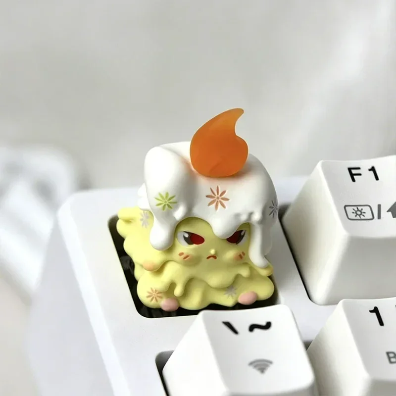 A close-up side view of the whimsical 'Weaver of Light' ESC resin artisan keycap, showcasing its ethereal yellow and purple glow and intricate handcrafted design.