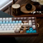 Artistic Western Cowboy PBT and transparent PC keycaps set, featuring rugged Wild West motifs, earthy palettes, and luminous accents from multiple angles.
