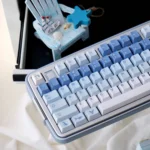 Ethereal Whale Dream PBT Keycaps Set gallery: various angles reveal durable PBT with tranquil whale designs on dreamy cloudscapes.