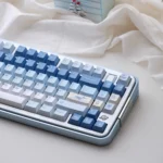 Ethereal Whale Dream PBT Keycaps set, durable PBT, tranquil Cherry Profile. Majestic whales on dreamy cloudscapes from various angles.