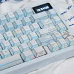 A detailed view of the Winter Letter Series Folded Shadow Keycap Set, highlighting its side-printed legends and light-reflecting angles.