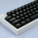 WOB PBT Keycap Set in various views, showcasing durable PBT, black and white contrast, ergonomic QXA profile for timeless elegance.