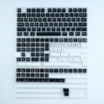 WOB PBT Keycap Set featuring striking black and white contrast, durable PBT material, and ergonomic QXA profile for timeless elegance.