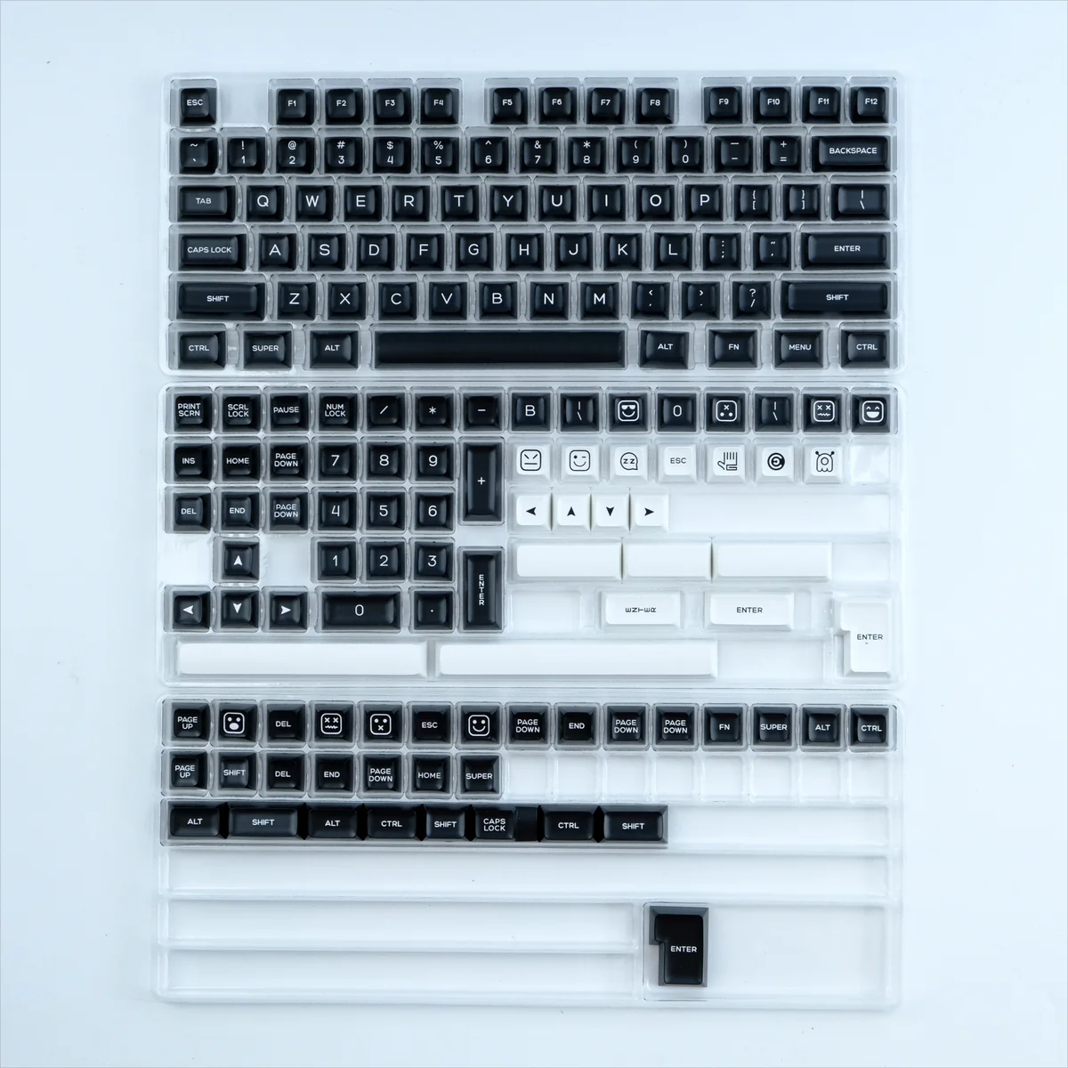 WOB PBT Keycap Set featuring striking black and white contrast, durable PBT material, and ergonomic QXA profile for timeless elegance.