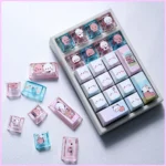 Yier & Bubu Whimsical PBT Dye-Sub Keycap Set displays charming illustrations, soft colors, and translucent PC accents, emphasizing its exclusive artistic design.