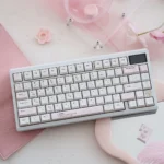 A captivating display of unique Yier Bubu keycaps set, showcasing whimsical PBT dye-sublimated art with vibrant, long-lasting legends.